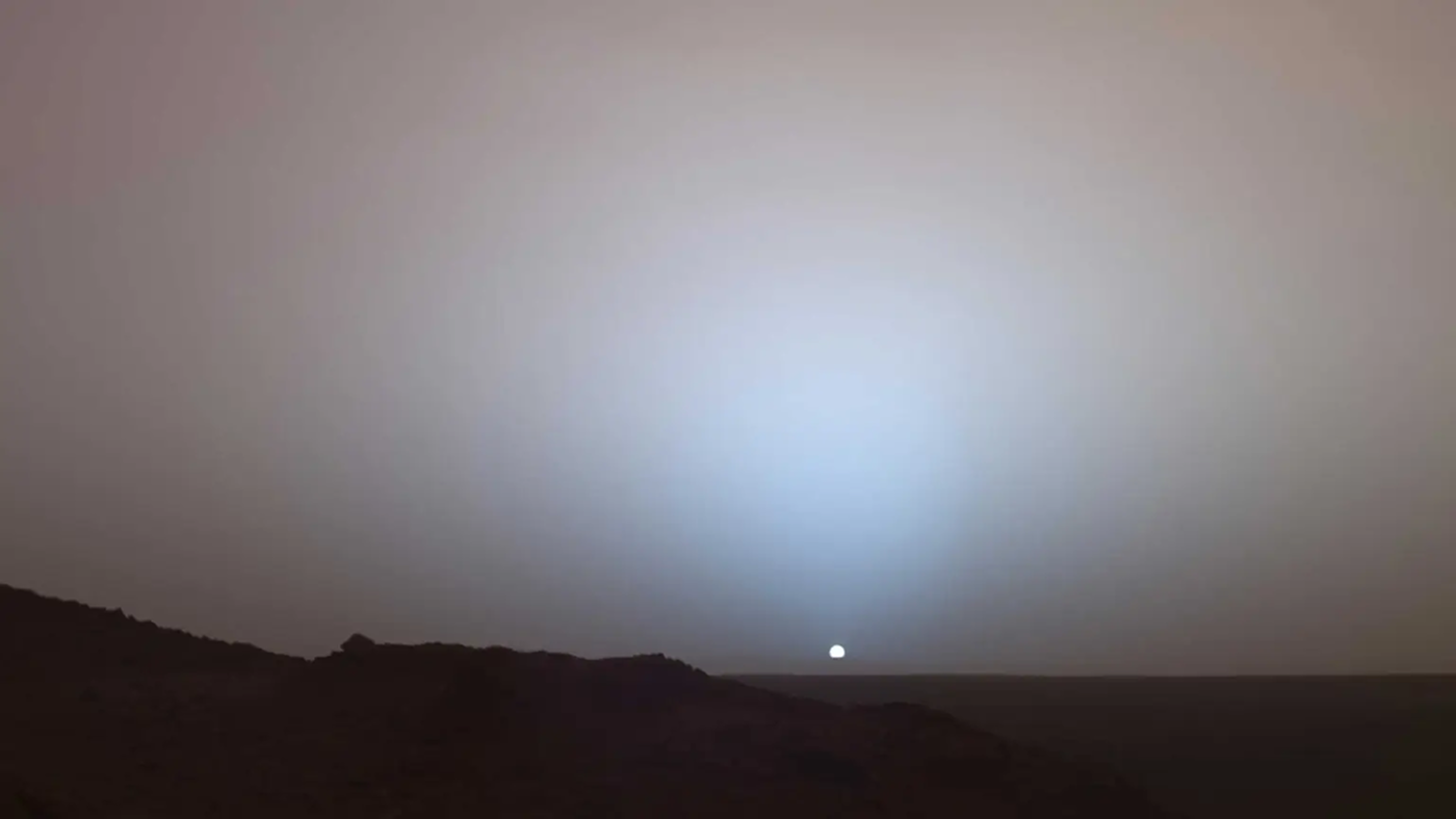 Photo of Martian sunset with blue halo taken by the Spirit rover